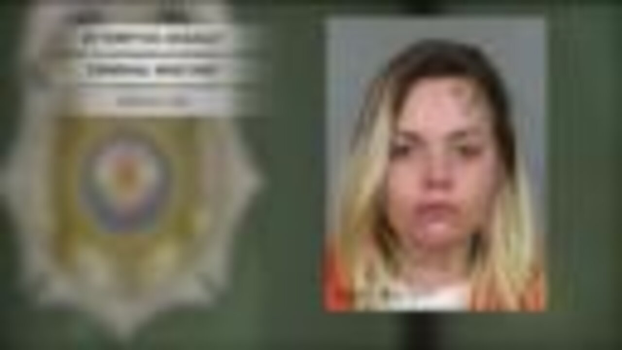 Woman arrested after road rage incident ends with crash outside ...