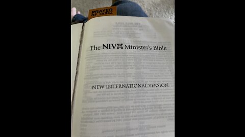 The NIV bible reading Ezra 2:1-70 and 1Corinthians 11:1-34