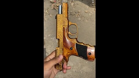 9mm gold color pistol use review