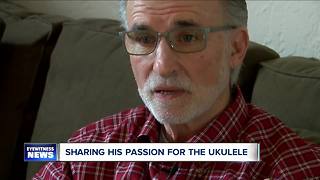 Music teacher sharing his love for the ukulele