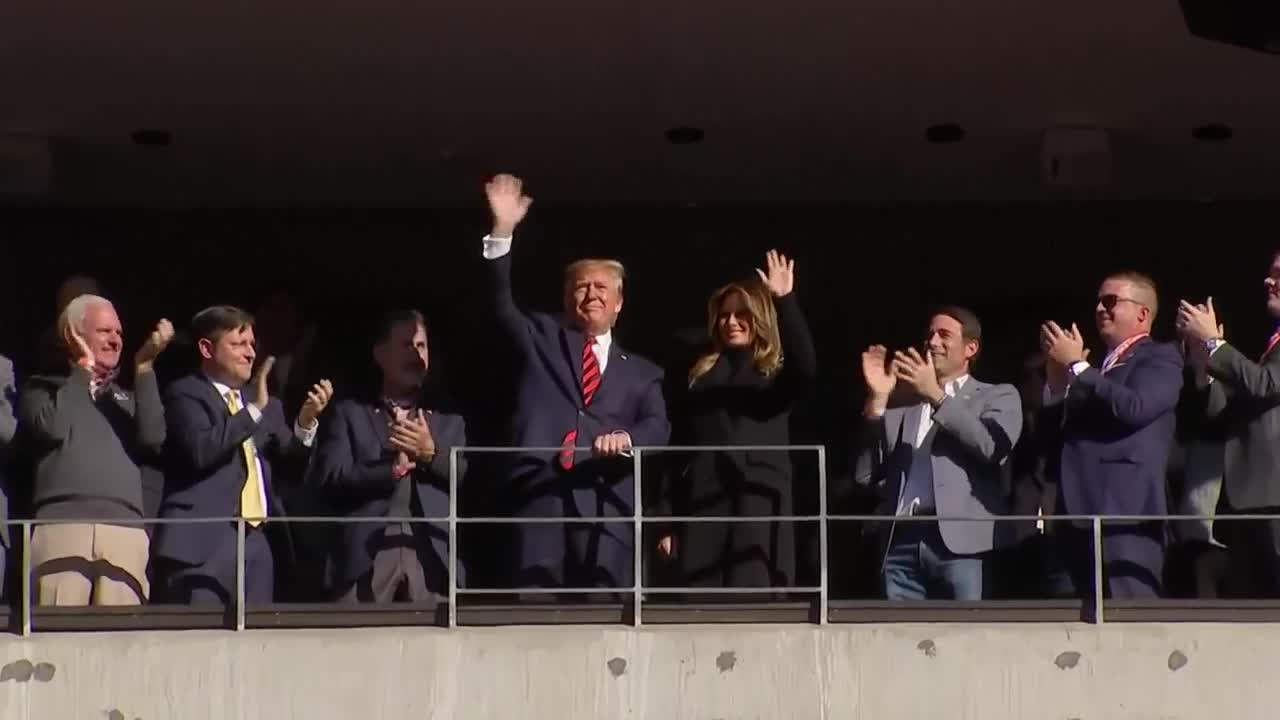 Trump soaks in Deep South cheers at college football matchup