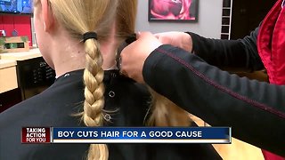 Despite getting teased, middle-school boy grows his hair long to help kids with cancer