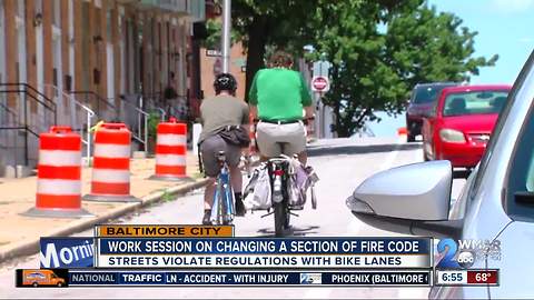 Debate continues over fire codes and their impact on bike lanes