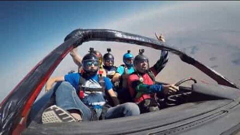 Daredevils skydive in a car