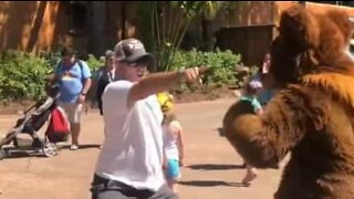 Dad dances hilariously with a bear