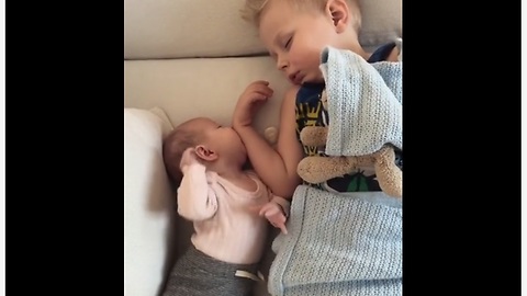 Soothing Baby Sister Puts Her Big Brother To Sleep