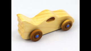 Handmade Wood Toy Bat Car From the Play Pal Series Clear and Amber Shellac with Metallic Blue Hubs