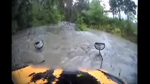 Bus drives into floodwaters, gets swept away