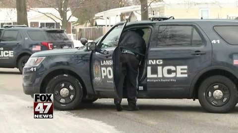 Lansing Police surround house after break-in