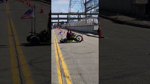 Shriners Practicing on Their Drift Trikes Before the Parade Starts