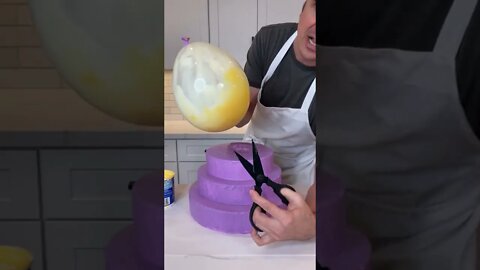 When the balloon POPS, the icing covers the CAKE PERFECTLY