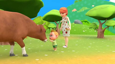 Little boy playing with cow