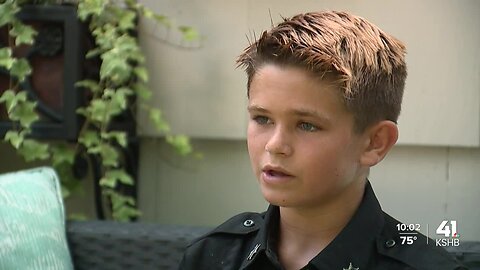12-year-old aspiring officer pays his respects to fallen Fairway officer Jonah Oswald