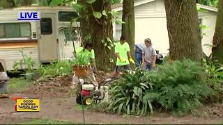 Volunteers give back to veterans with cleanup