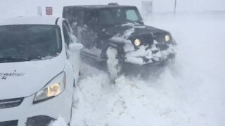 Winter car hacks: How socks and hand sanitizer can help deal with ice