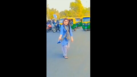 young lady dancing on the road