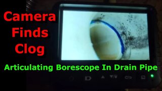 Camera Finds Clog - Articulating Borescope In Drain Pipe