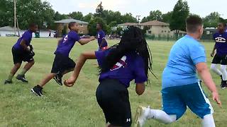 Flag football league teaching kids about the game