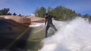 Surfers hang ten on the expert wave in the Boise whitewater park