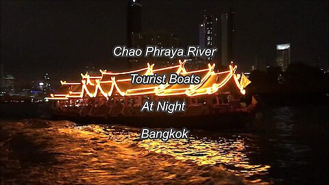 Chao Phraya River tourist boats in night, Bangkok, Thailand