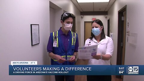 Volunteers playing a big role behind the scenes at vaccination sites