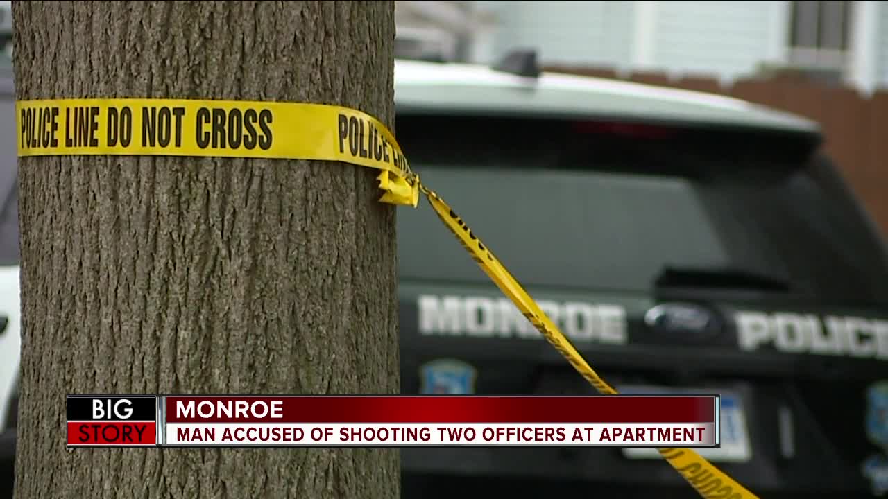 2 police officers injured in shooting at apartment complex in Monroe