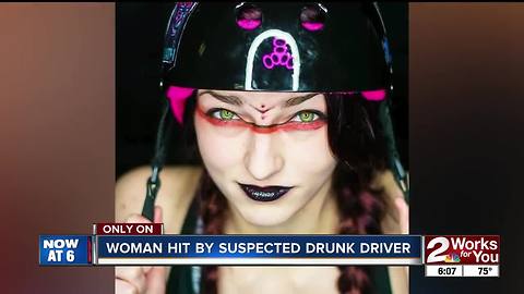 Woman saves friend hit by suspected drunk driver