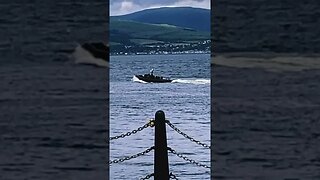 Black boats on the Clyde