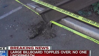 Giant billboard crashes down on South Bay road