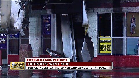 Police at scene of smash-and-grab turned building fire in Detroit strip mall