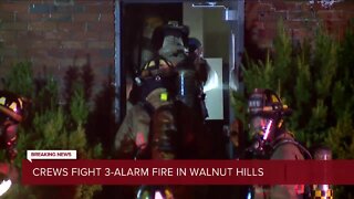 Three-alarm fire rips through building in Walnut Hills Tuesday morning