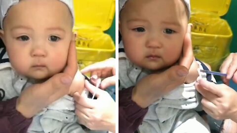 After getting the injection, the baby became sad and started crying