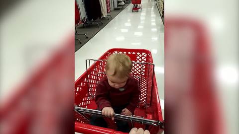 "Baby Boy Falls Asleep In A Shopping Cart"