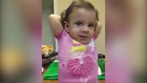 "Toddler Girl Babbles Along to Mom's Made Up Song"