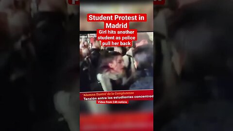 Madrid Police pull girl back after she hits another student #shorts