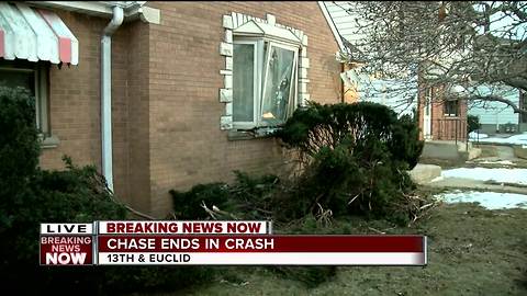 Overnight police chase ends with crash into home on Milwaukee's south side