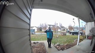 Amazon delivery driver salutes house of Air National Guard member in New Baltimore