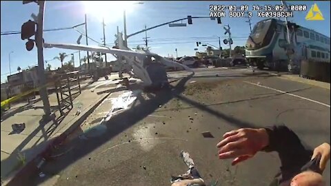 INCREDIBLE: LAPD Pull Pilot From Crashed Plane Moments Before Getting Hit By Train