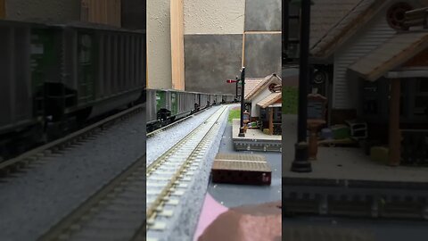 N Scale Kato SD40s pulling a coal train.