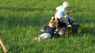 Boy Test His Strength While Pushing His Power Wheels