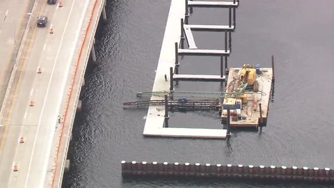 Crane collapses at marina in Bradenton | Action Air 1