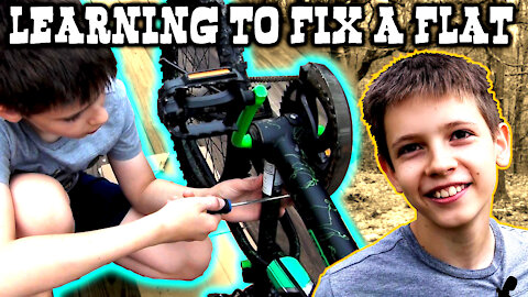 Teaching My Oldest Boy How To Fix a Bicycle Flat
