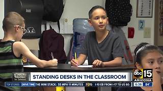 Donated desks help students stand in class