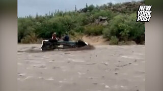 Bystanders Rescue Father and Son From Arizona Floodwaters