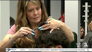 Omaha barbers and stylists provide free back to school haircuts to students
