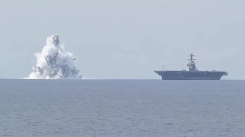 US Navy sets off massive, live explosives next to aircraft carrier