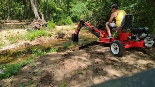 Digging out some creek with the Harbor Freight Backhoe