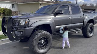 Three year old cleans Toyota Tacoma