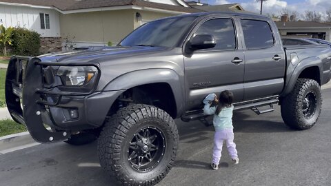 Three year old cleans Toyota Tacoma