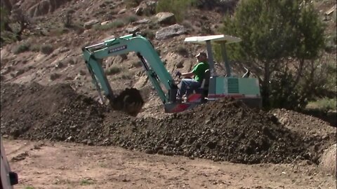 Yanmar YB451 Excavator Cleaning A Ditch